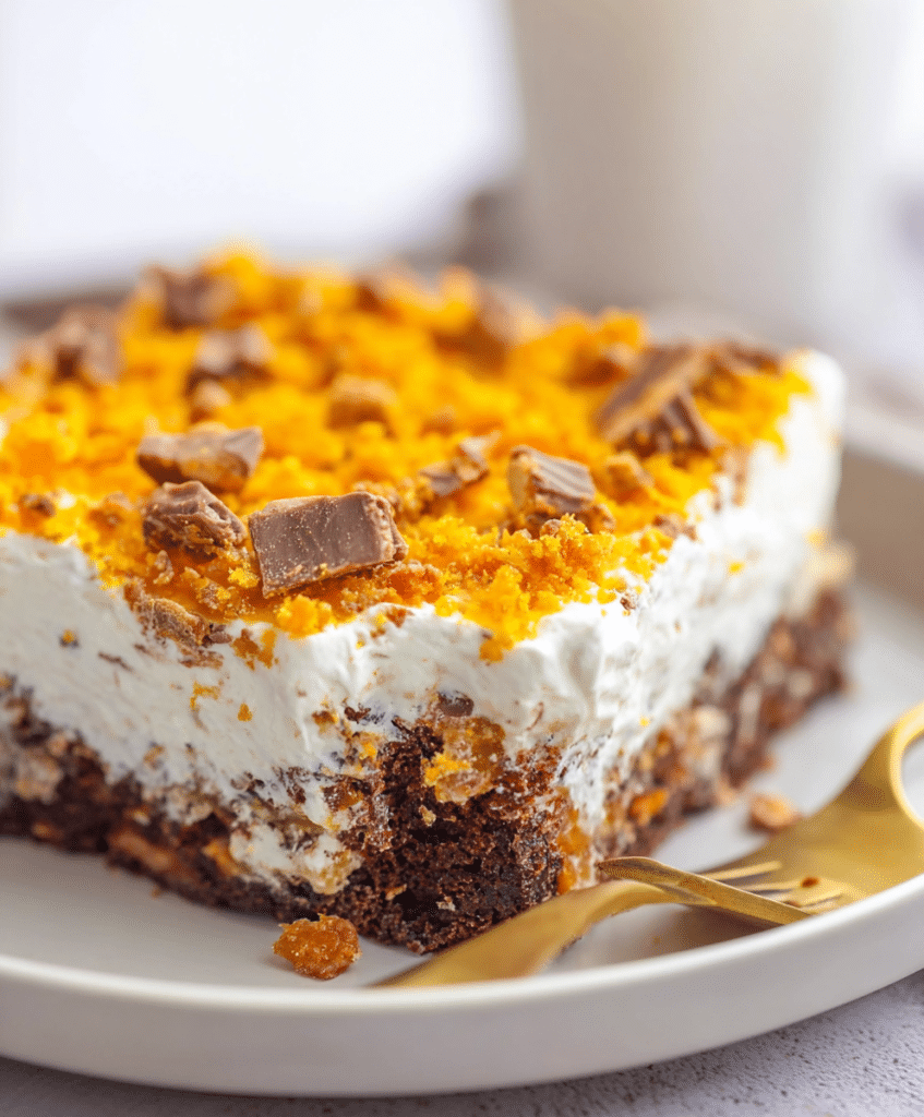 u6852584378 httpss.mj .run DJ7Im7qYRs Butterfinger Poke Cake d22d87e0 3eb4 4045 b68d 7bc5e7d7f8d4 1